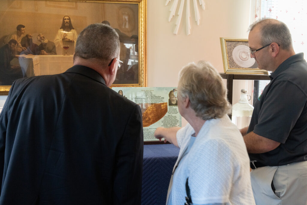 Karen Sigler provides a tour of the Rhoda Wise House to Bishop David Bonnar on July 7, 2023. Photo by Brian Keith.